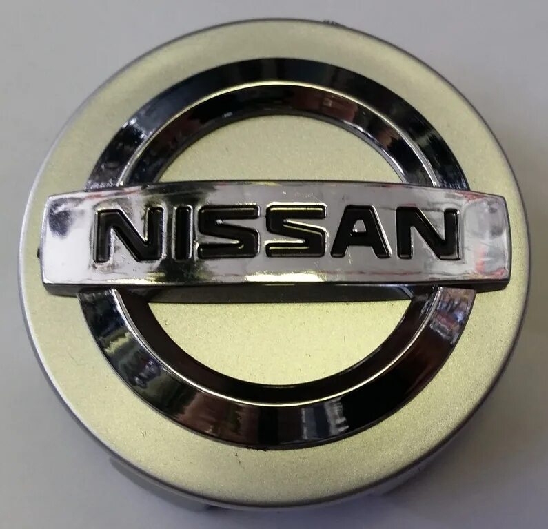 Центральный колпачок на диск. Колпачок ступицы Ниссан 60мм. 60 Заглушка диска Ниссан. Колпачок ступицы литого диска Nissan. Колпачок на литой диск Nissan 60 мм.