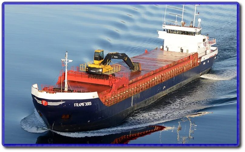 Cargo vessel. Dry Cargo Vessel. Deck Cargo Vessel. Dry General Cargo. Loading on Dry Cargo Vessel.