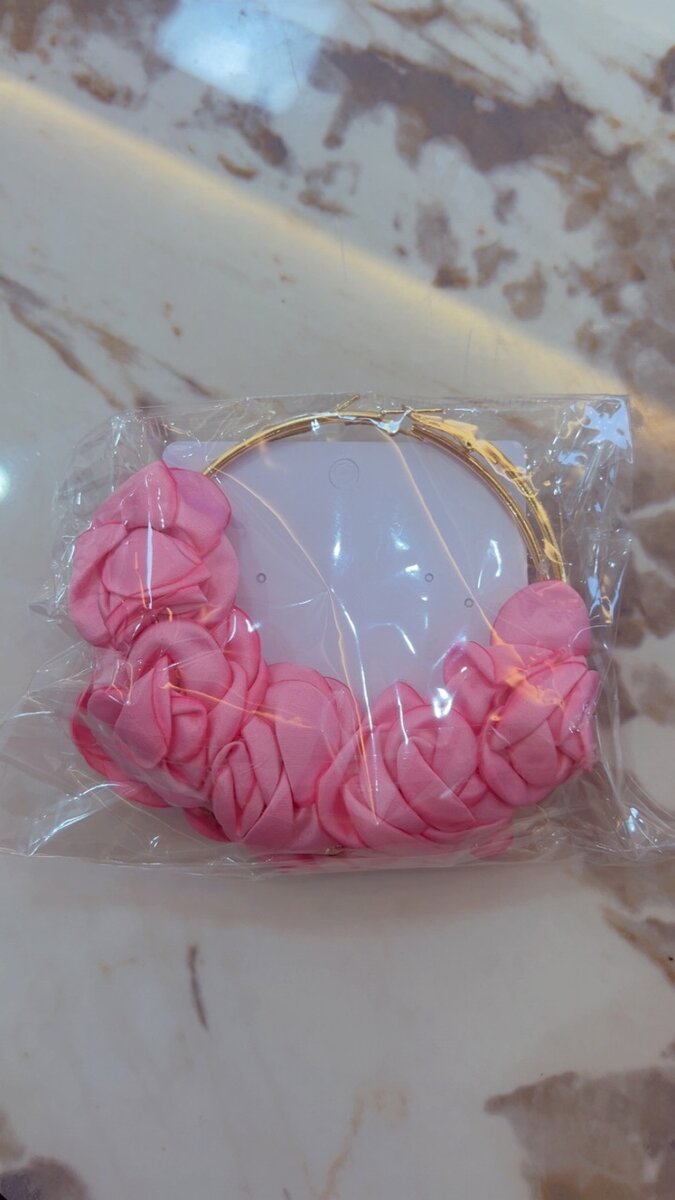 Boucle d'oreille en fleur