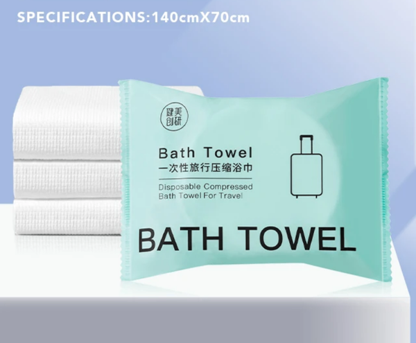 Serviette de bain compressée