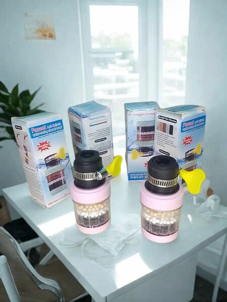 Filtre a eaux pour robinet