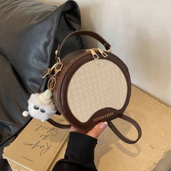 Sac rond en cuir tissé pour femmes