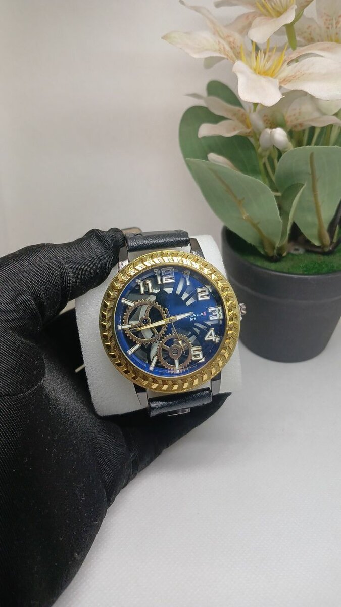 Black stap wrist watch