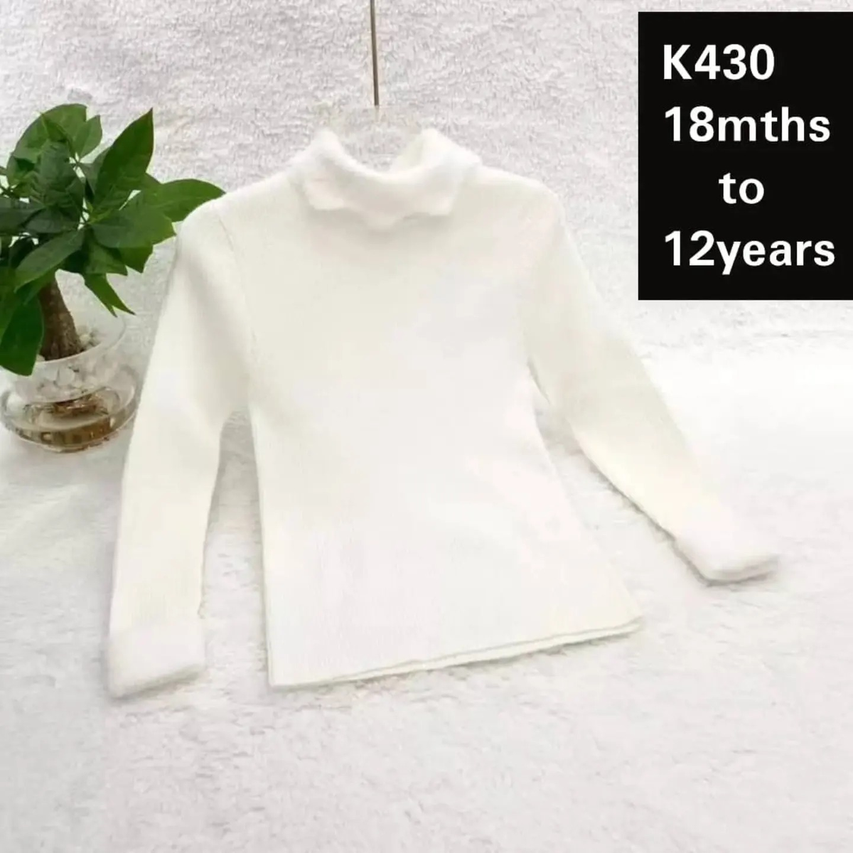 white sweater
