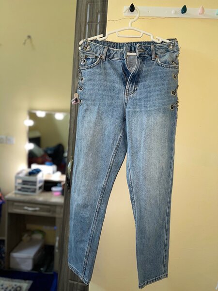 Pantalon jean à chaîne