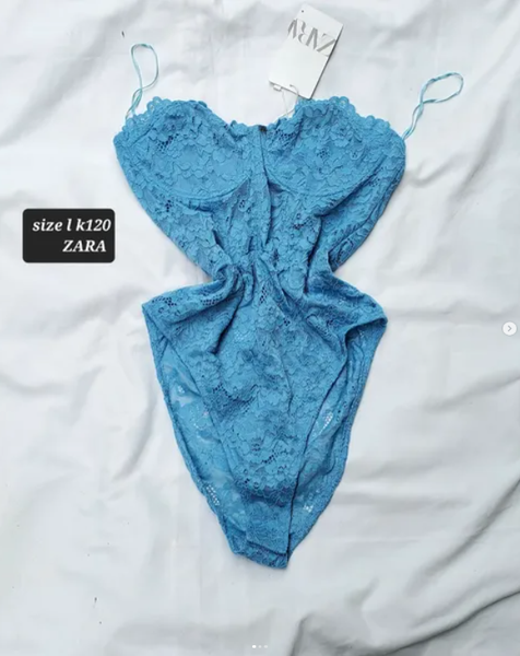 blue bodysuit