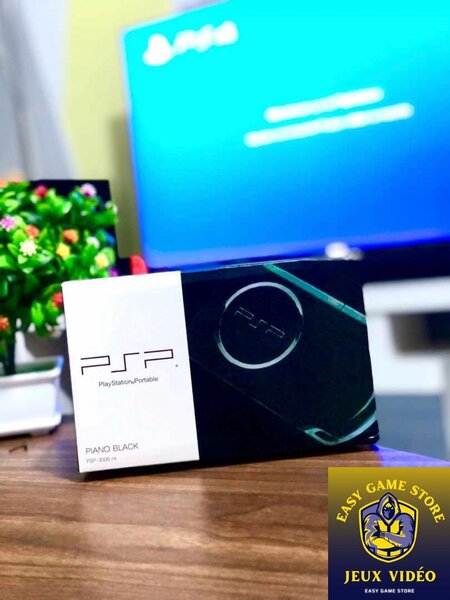 PSP NEUF DISPONIBLE 30 JEUX + LE CHARGEUR