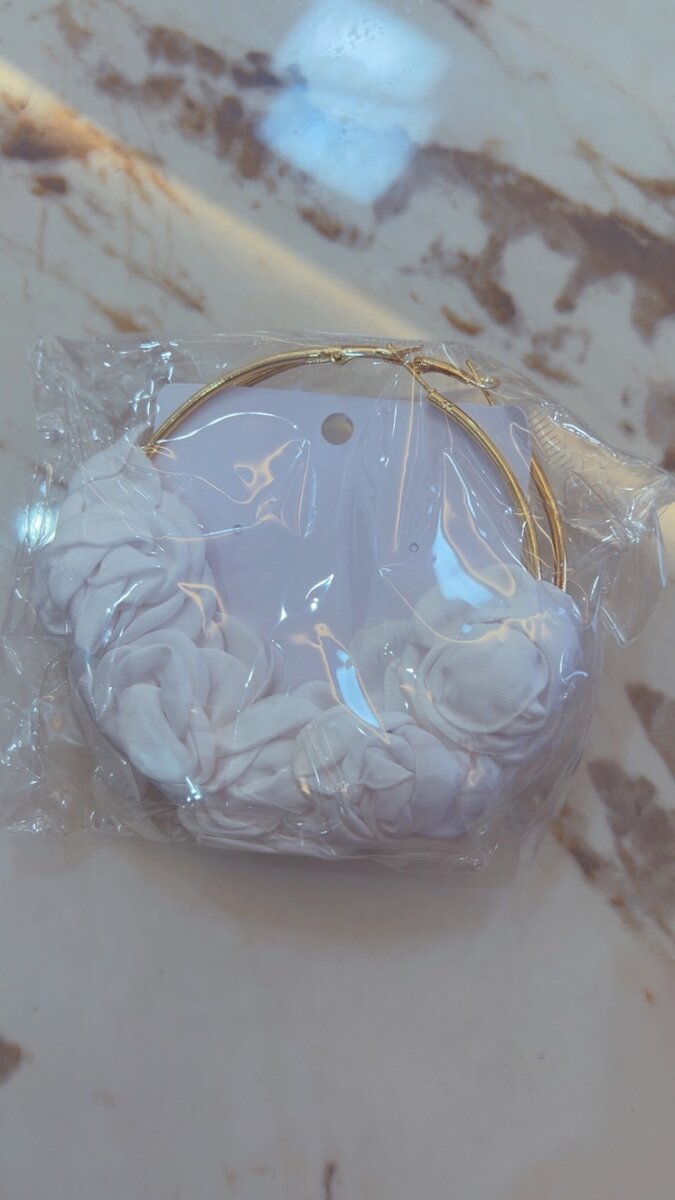 Boucle d'oreille en fleur