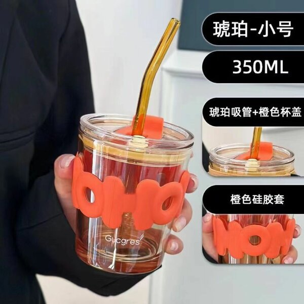 Glass cup with straw