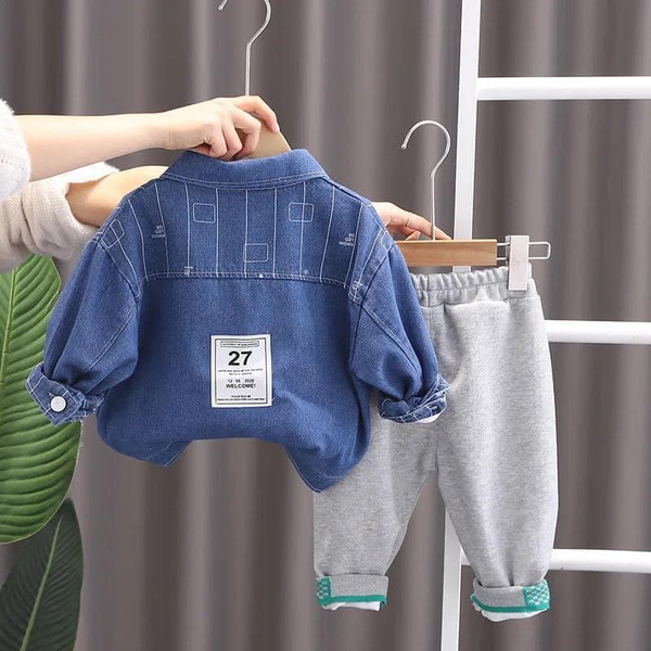 gray suit trousers and denim jacket