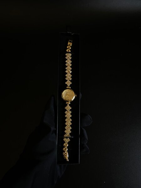 Gold tone watch