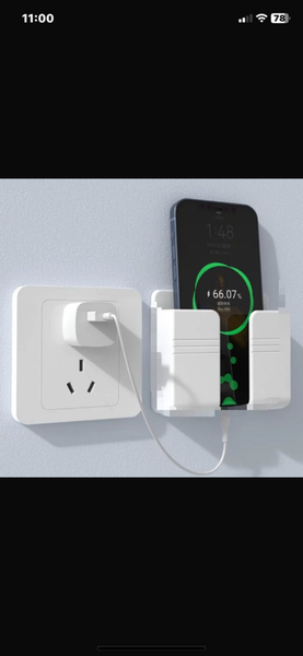 Wall phone holder