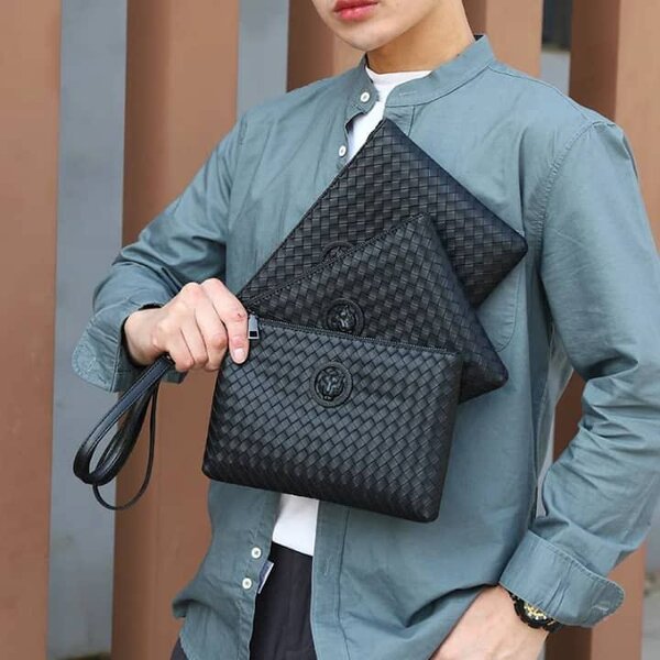 Pochette en cuir tressé homme