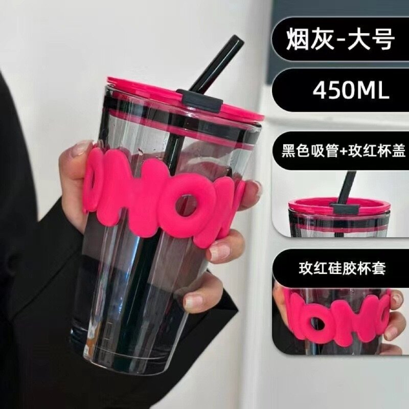 Glass cup with straw