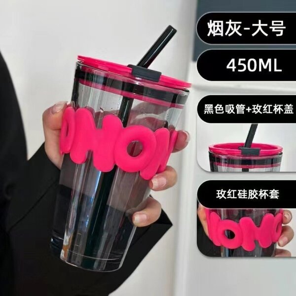 Glass cup with straw