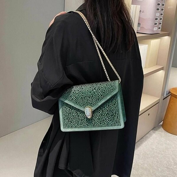Stoned cross body bag with chain straps