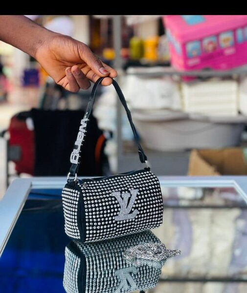 Shiny channel purses