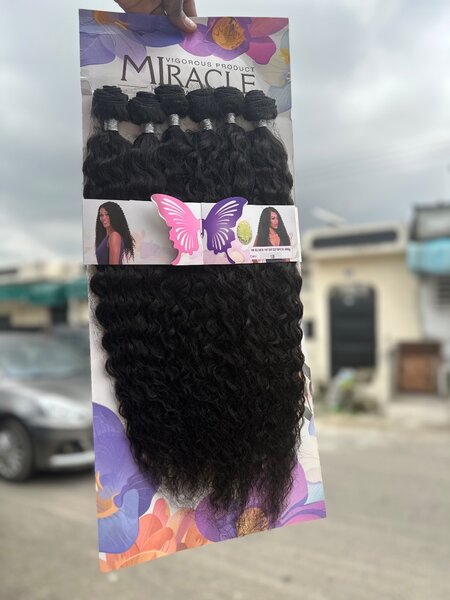 Extensions cheveux bouclés