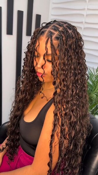 Mèches bouclées boho braids