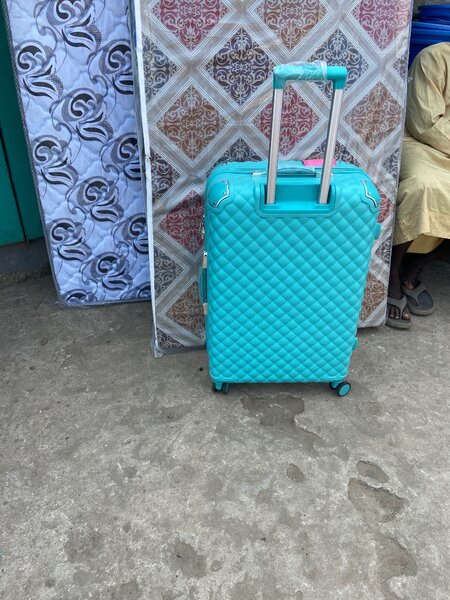Valise à roulettes turquoise