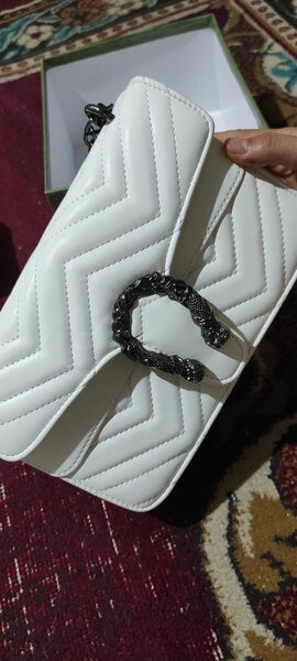 GUCCI.