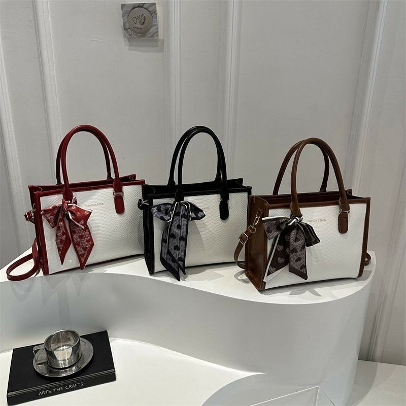 Élégant sac à main avec noeud