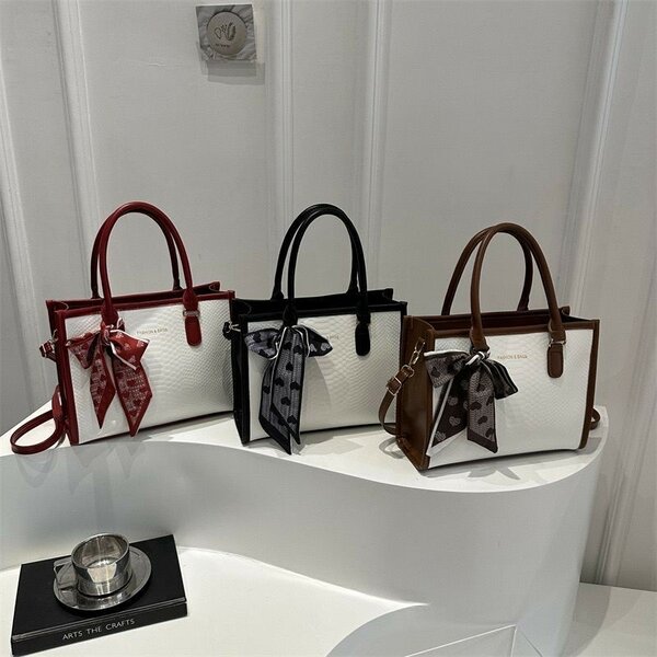 Élégant sac à main avec noeud