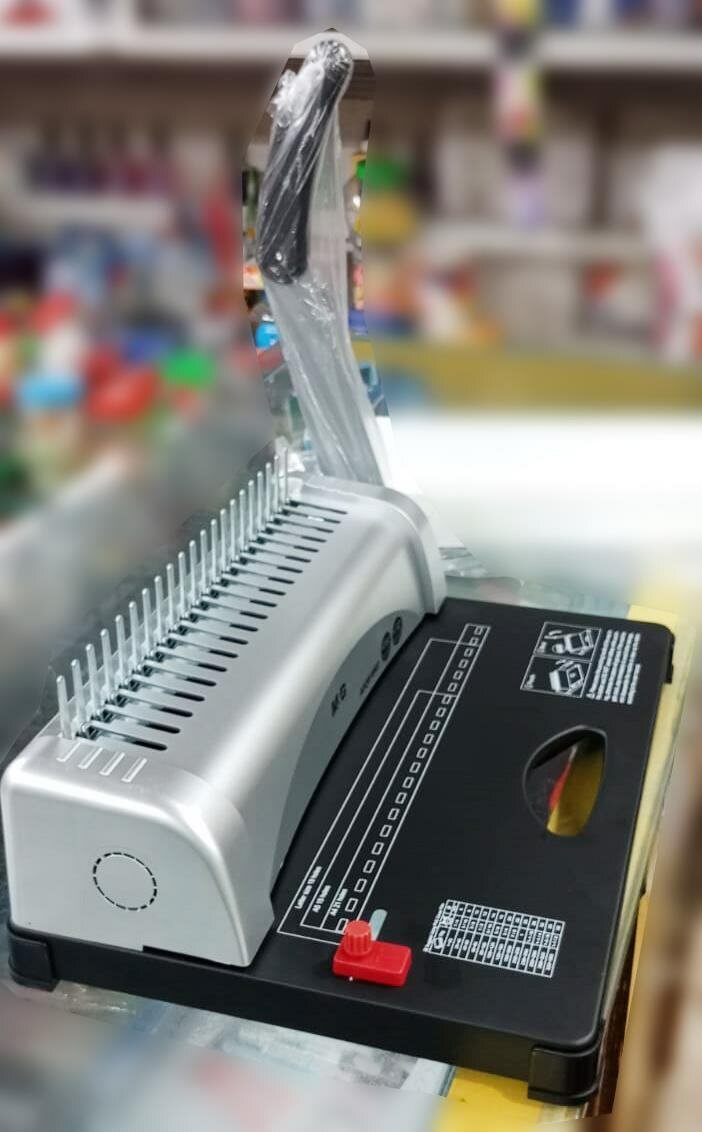 Machine à reliure