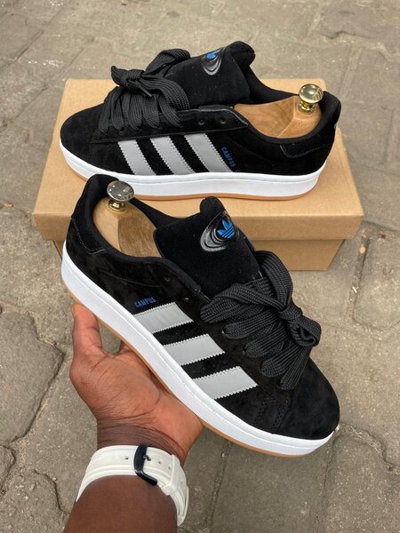 Sneakers noirs en daim pour hommes