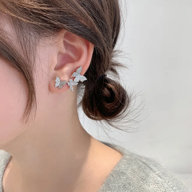 Boucle d'oreille en forme de papillon