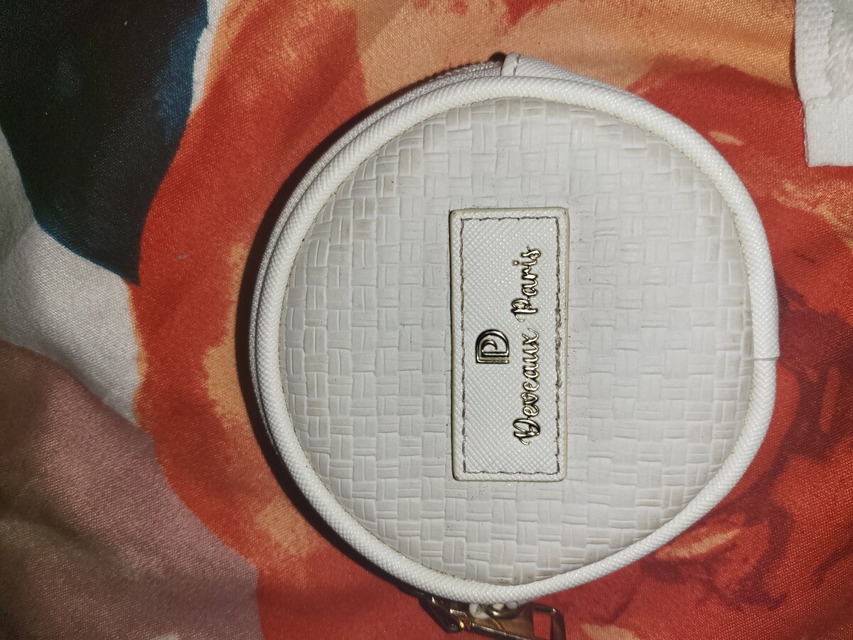 Pochette Ronde Tissée Élégante