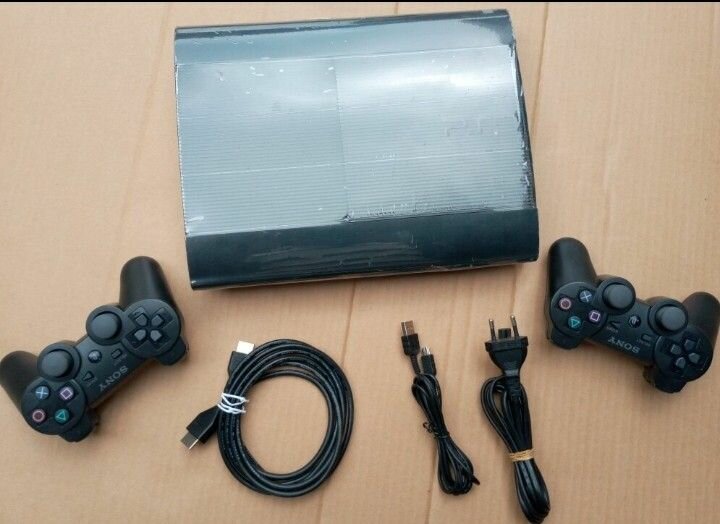 Console PS3 avec manettes