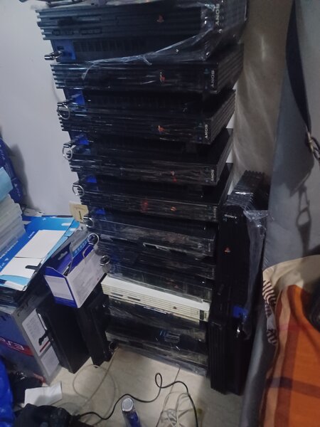 Ps2 fat + 2 manettes 25 jeux