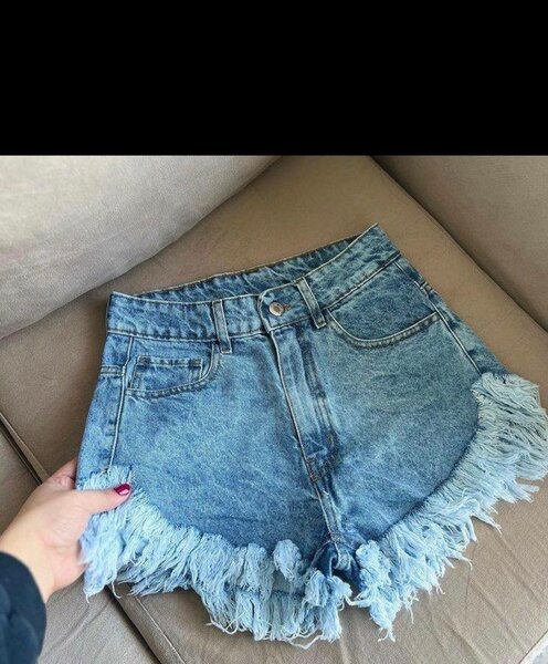 Shorts en denim à franges
