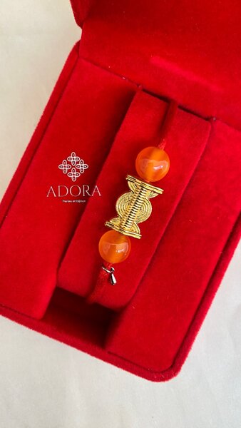 Bracelet avec poids baoulé