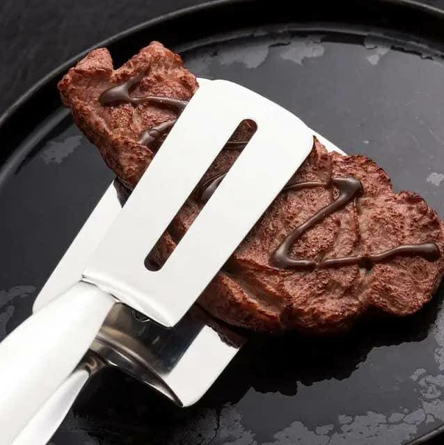 Pince à retournement alimentai