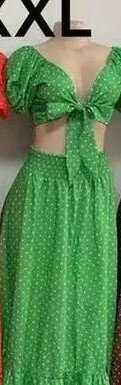 Beautiful and stylish women's dress with open belly in speckles