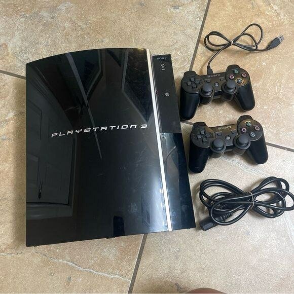 Console Playstation 3 avec manettes