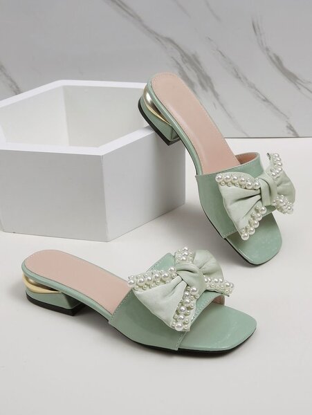 Heeled slippers
