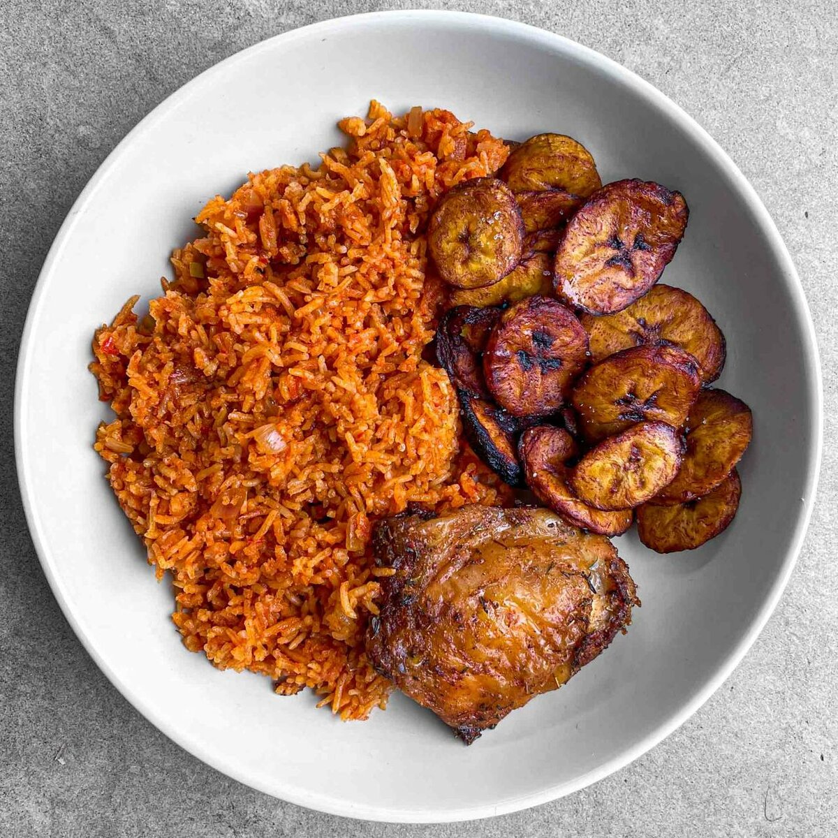 Jollof with fried plantain and chicken