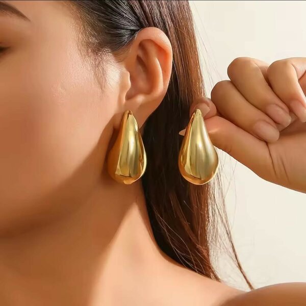 Boucles d'oreilles dorées design