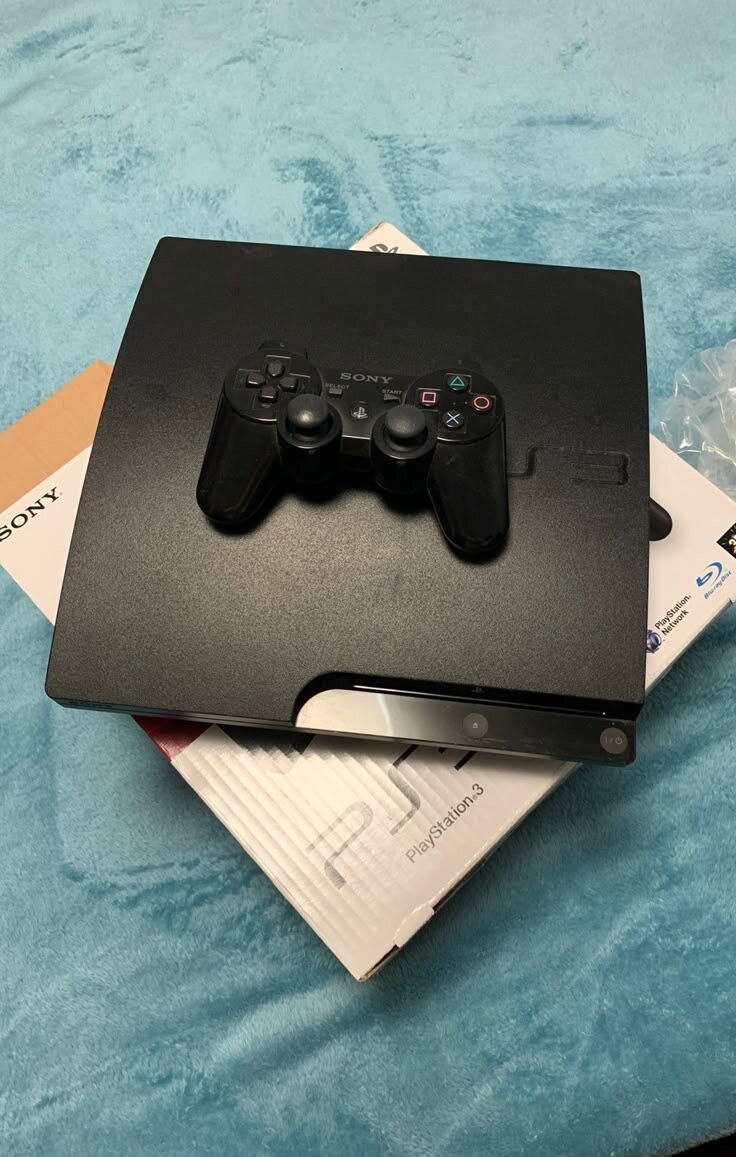 Console PS3 Slim avec manette
