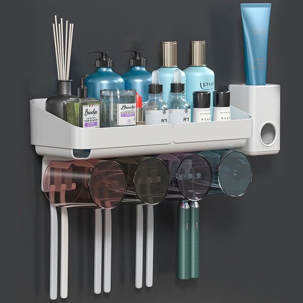 Toothpaste dispenser/toothbrush holder with cups