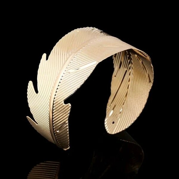 Bijou de bras en  plume or