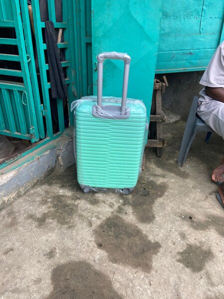 Valise à roulettes turquoise