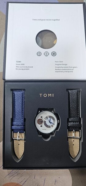 Томи