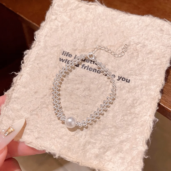 Bracelet en perles argentées