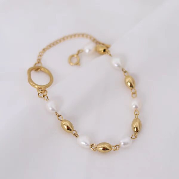 Bracelet perles élégantes or