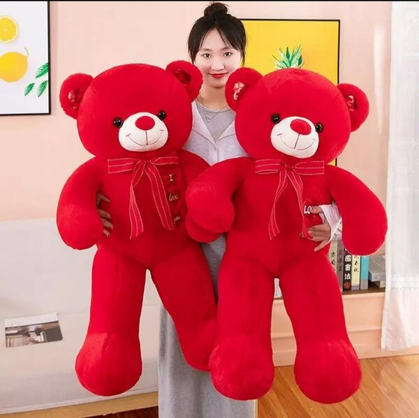 Ours en peluche rouge géant