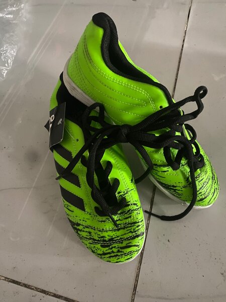 Kids turf boots